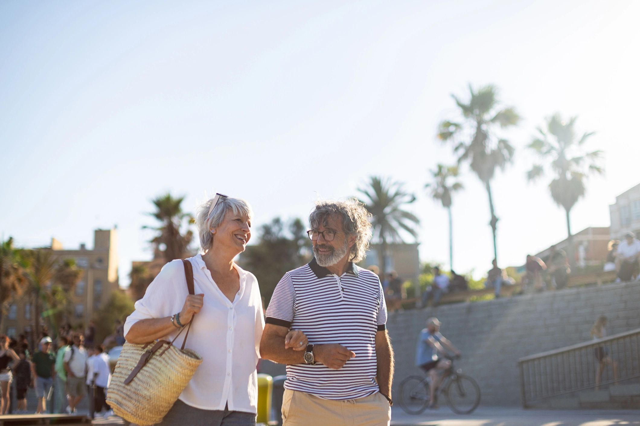 Senior couple walking together outdoors representing long-term retirement planning